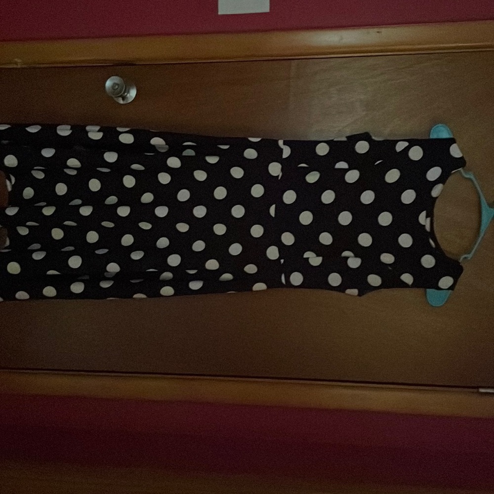 Black And white polkadotted dress zips up in the back